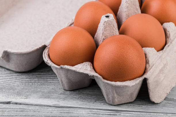 istock Egg, Chicken eggs in the package on a white background. Chicken eggs in a cardboard box. 2164588068