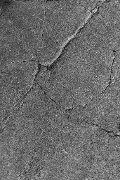 istock Cracked concrete wall texture, Cement background not painted in vintage style 2164588623