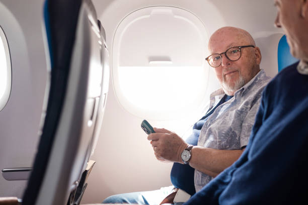 istock Senior Man Enjoying a Flight 2164588843