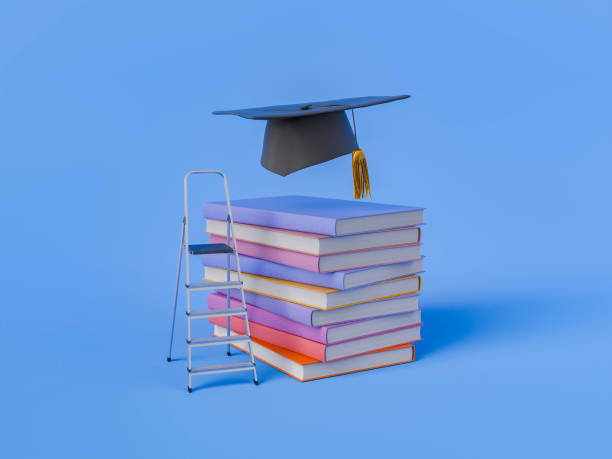 istock Graduation Cap on Stack of Colorful Books with Ladder on Blue Background 2164590967