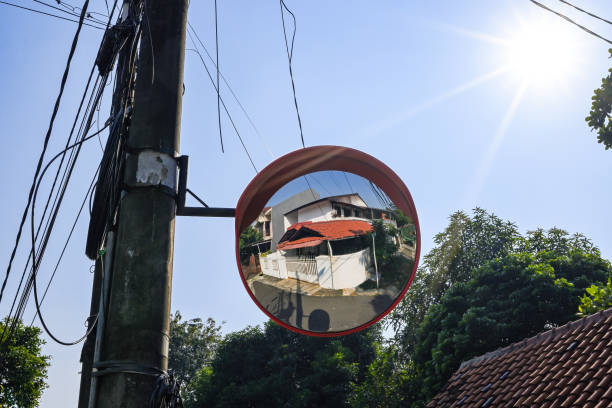 istock A pole with a mirror on it and wires hanging from it 2164591060