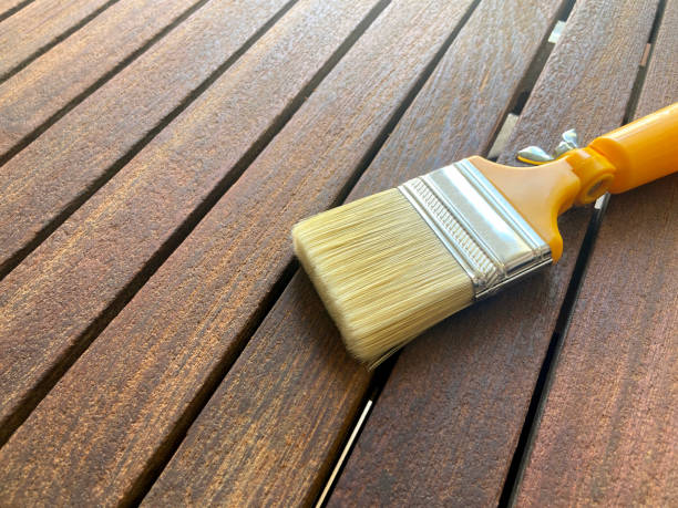 istock Paintbrush on the teak wood background 2164593792