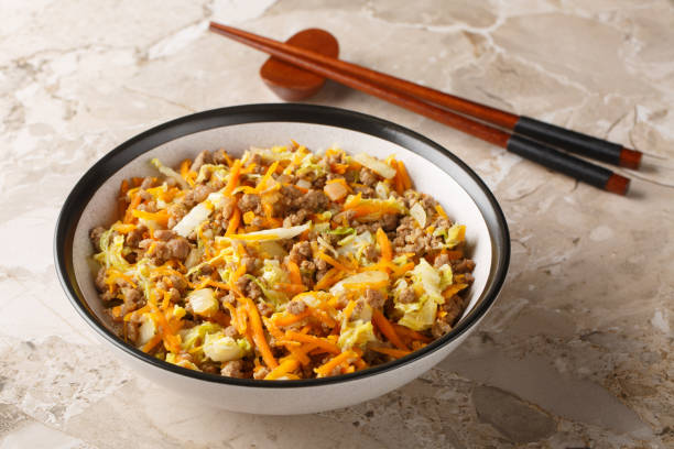 istock Egg roll bowl it is a meal combines ground pork, shredded cabbage, and our favorite eggroll closeup. Horizontal 2164594493