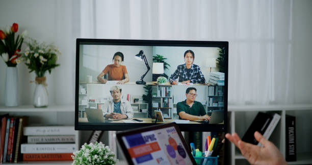 istock Businesswoman explains work in video conference with colleagues via computer 2164595525