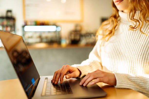 istock Woman working at home office hand on keyboard close up. 2164603099