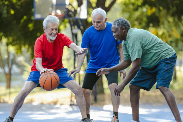 istock Senior men playing basketball 2164605329