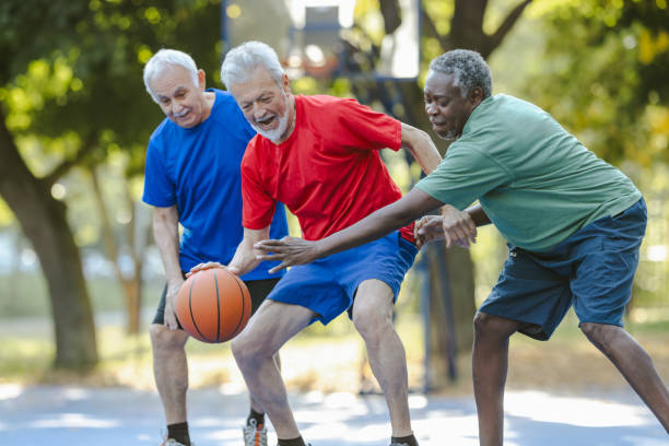 istock Senior men playing basketball 2164605331