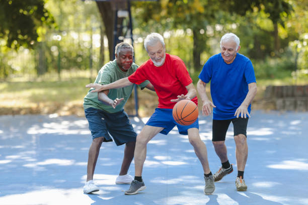istock Senior men playing basketball 2164605636