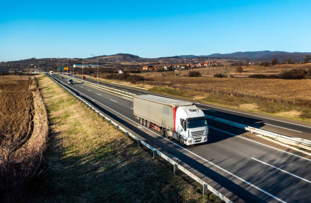 istock Transportation Truck on road 2164605825