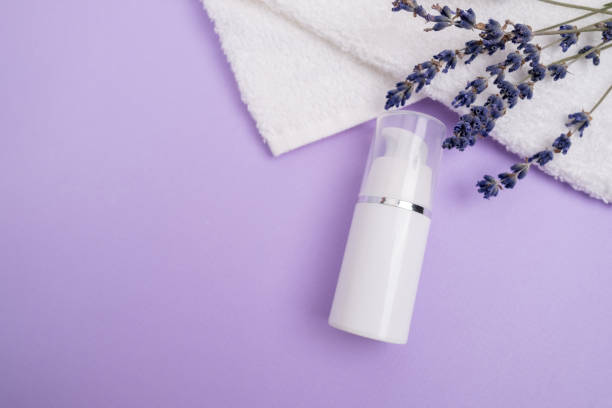 istock Container for cream, shampoo, toiletries, spa. Unbranded white plastic bottles. Bottle with a dispenser for cosmetic products. Skin care and beauty concept. Mockup style, copy space 2164611313