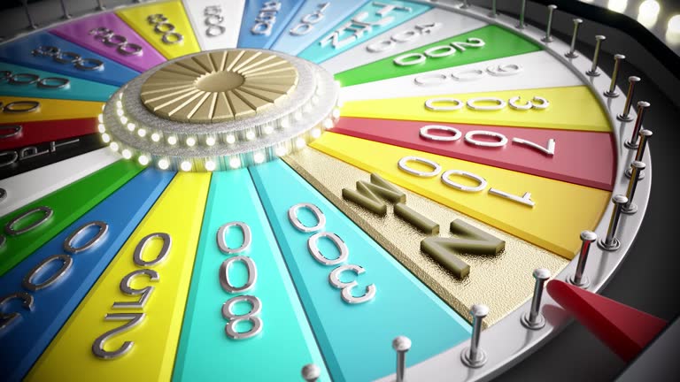 3D Animation of Colorful Game Wheel Spinning With Various Prize Amounts In A Studio Setting