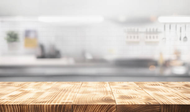 istock End grain wood counter table top on blur white minimal kitchen background.For montage product display 2164613786
