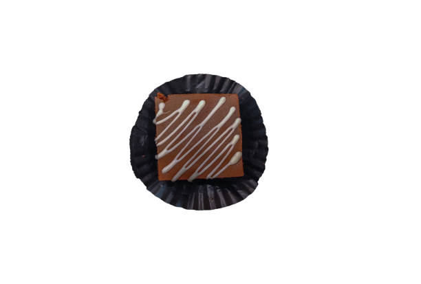 chocolate brownies with white chocolate toping isolated background