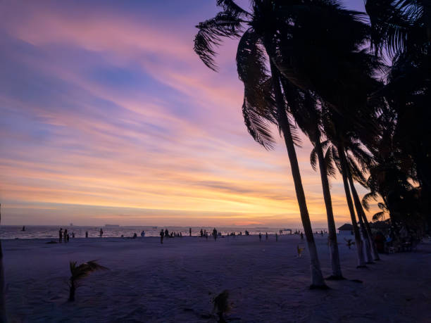 isla mujeres is an island located in Mexico and offers the most beautiful and colorful sunsets