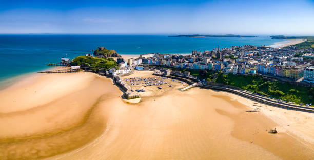 istock Panoramic view of a huge sandy beach and dry harbor at low tide (Tenby) 2164623208