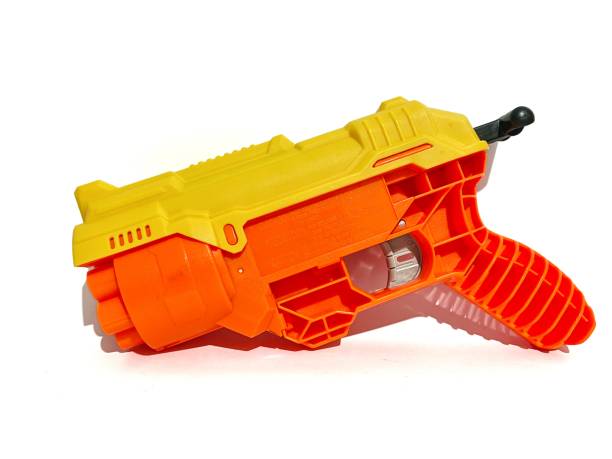 istock Children gun toy isolated on white background 2164625078