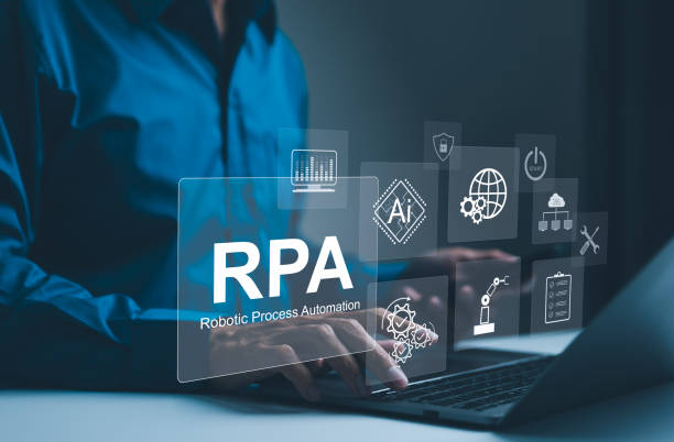 istock RPA, Robotic Process Automation Technology Concept. Businessman working on laptop with digital icons represent robotic process automation and AI, illustrating modern innovation and automation tech. 2164627174