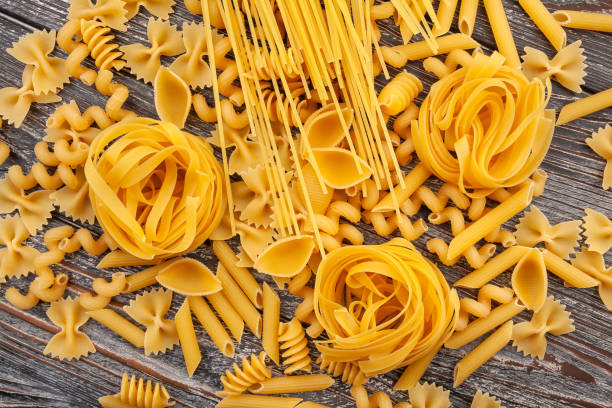 istock pasta mix on wood 2164630782