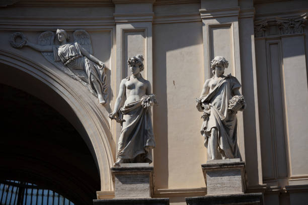 Night view of statues at Basilica della Collegiata In Catania, Sicily