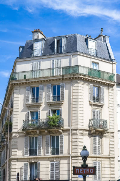 istock Paris, parisian buildings, with a subway sign 2164636162