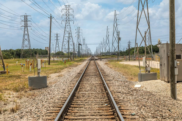 Straight rail tracks through an industrial area in Texas