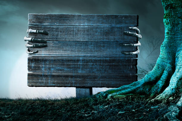 Skeleton Hands Hold An Old Wooden Sign