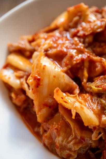 istock kimchee in white bowl in close-up 2164642665