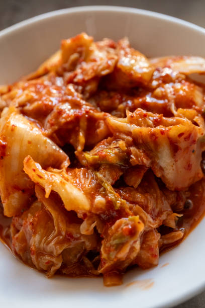 istock kimchee in white bowl in close-up 2164642726