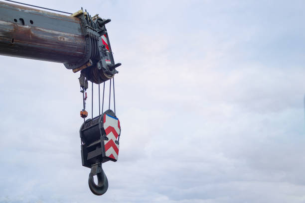 istock Detailed Analysis of the Superstructure of Mobile Cranes: Emphasizing the Hook, Boom Section, and Sling Fall Reeving to the Pulley of a Hook 2164642987