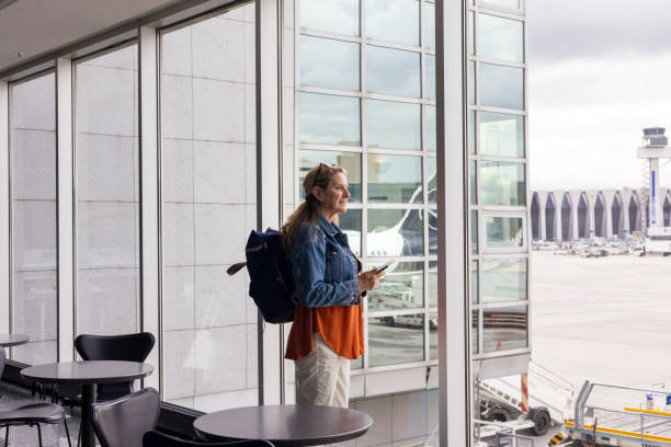 istock Looking At All The Planes Coming In 2164643450
