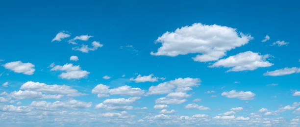 istock Panoramic background of blue sky with cumulus clouds 2164645121