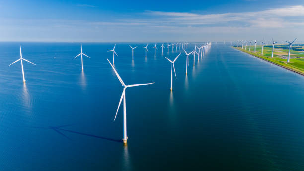 istock Captivating Windmill Turbines Harnessing Renewable Energy Over Tranquil Waters in the Netherlands 2164651469