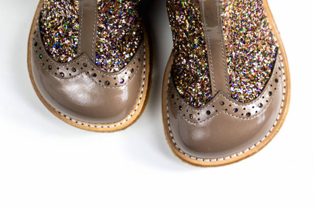 istock Little kids boots with glitter on white 2164653071