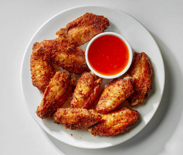 istock baked crispy chicken wings 2164654343