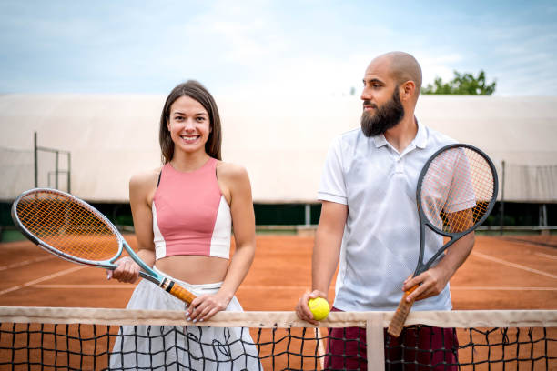 istock Cheerful tennis players 2164654768