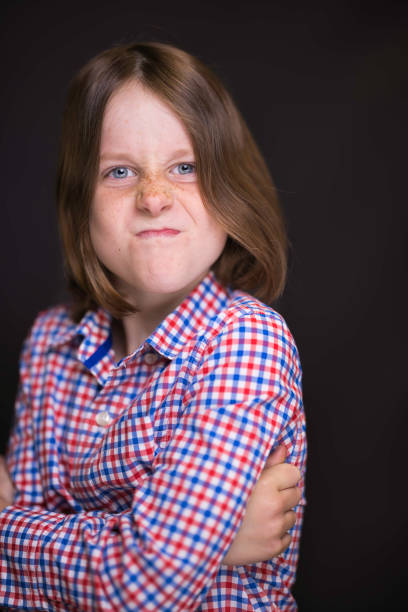 Blue-eyed boy with long, straight hair.
