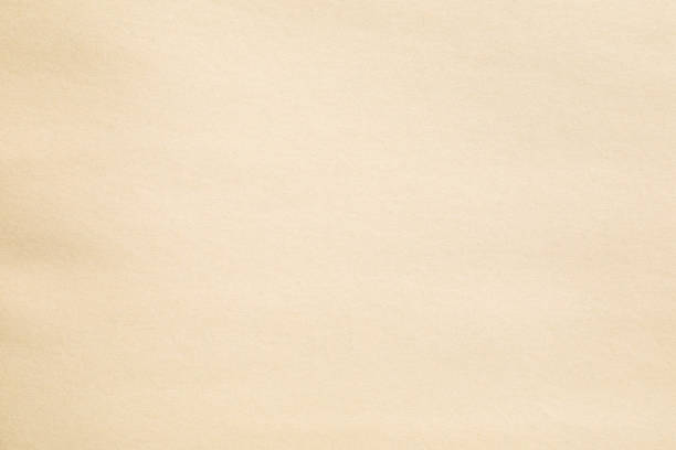 Pale brown paper surface texture macro closeup