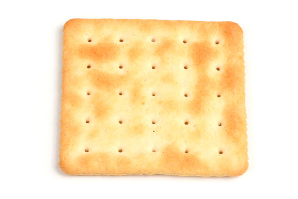 istock Square shortbread cookies isolated on white background. Stacked butter biscuits for coffee or tee. 2164660590