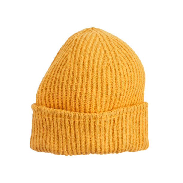 istock Bright orange knitted hat close-up. A warm and stylish accessory with an expressive texture, ideal for the cold 2164661626