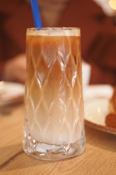 istock iced late in a transparent glass on cafe table 2164667181
