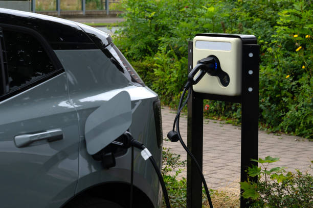 istock Electric car charging at public station. 2164667752