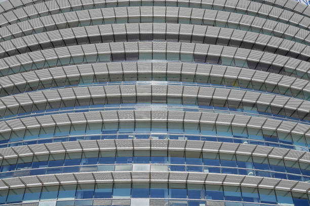 istock pattern of grey aluminium and glass windows in modern office 2164669659