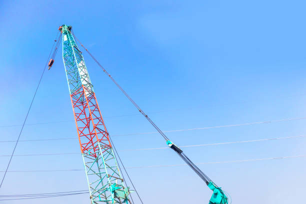 istock A large construction crane works on a high-rise building construction project. 2164673371