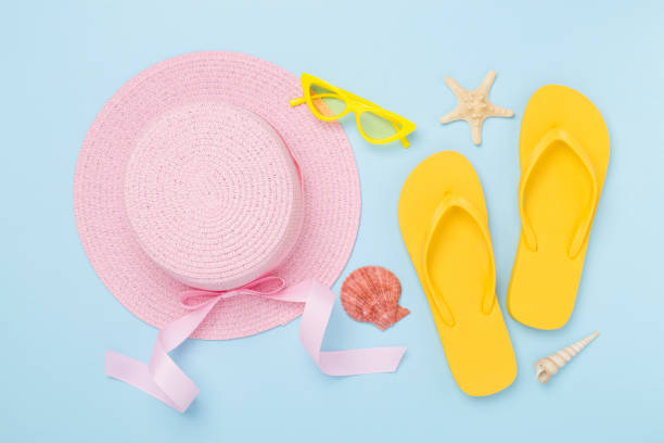 istock Flat lay with colorful beach accessories on color background. Vacation concept 2164673513