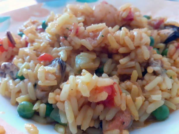 istock fisherman's rice with tomatoes and peas 2164673743