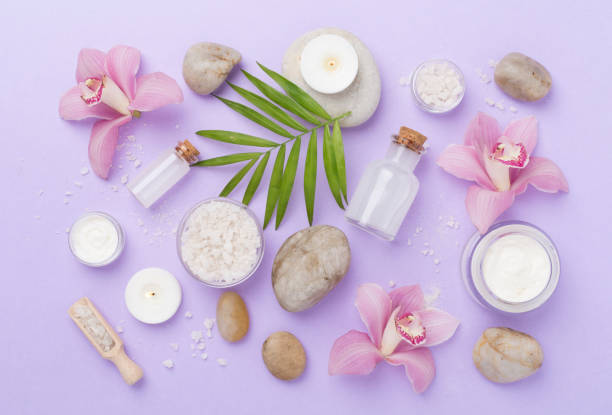 istock Composition with orchids, spa products on color background, top view 2164674049