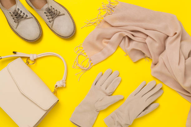 istock Stylish autumn accessories on color background, top view 2164675163