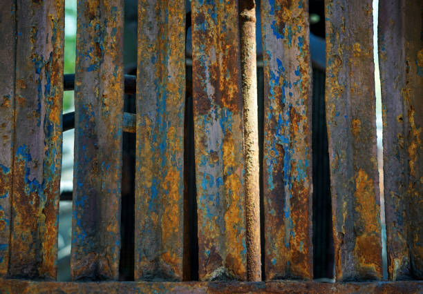 istock Rust on iron bar with blue and yellow color.Corrosive grunge rusted on old iron.Pattern grunged rust as illustration for presentation background.Rusty corrosion or oxidized texture.Close up. 2164678339