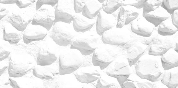 istock Empty monochrome black and white (light gray) embossed stone wall for abstract background and texture for interior or exterior design. Beautiful patterns, space for work, banner, wallpaper close up. 2164678509