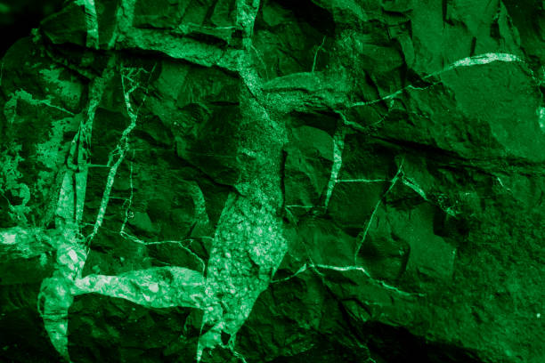istock green background of stones, mining origin 2164700678